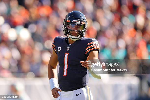 Justin Fields of the Chicago Bears reacts after a play during the first half in the game against the Miami Dolphins at Soldier Field on November 06,...