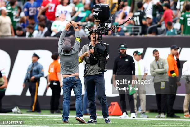 Crews work to repair a Skycam in the second half of a game between the Buffalo Bills and the New York Jets at MetLife Stadium on November 06, 2022 in...