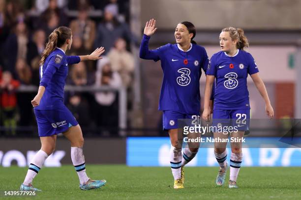 Sam Kerr of Chelsea celebrates with Erin Cuthbert and Guro Reiten after scoring their team's first goal during the FA Women's Super League match...