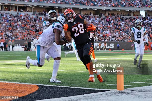 Joe Mixon of the Cincinnati Bengals scores a touchdown during the third quarter in the game against the Carolina Panthers at Paycor Stadium on...