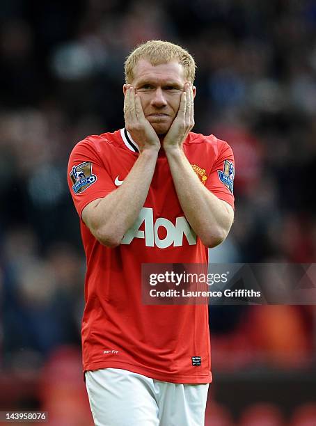 Paul Scholes of Manchester United looks dejected at the end of the Barclays Premier League match between Manchester United and Swansea City at Old...