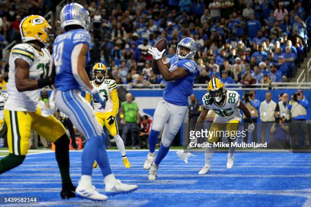 James Mitchell of the Detroit Lions catches a touchdown pass in the third quarter of a game against the Green Bay Packers at Ford Field on November...