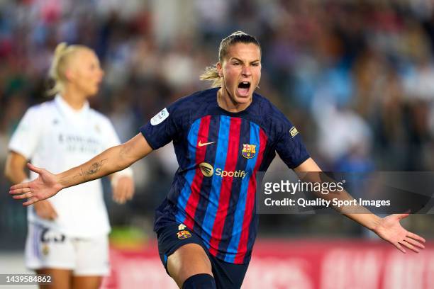 Ana-Maria Crnogorcevic of FC Barcelona celebrates after scoring her team's first goal during The Liga F match between Real Madrid and FC Barcelona at...