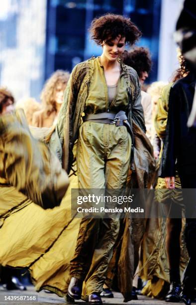 Model in designer Norma Kamali's parachute coat and jumpsuit for Fall 1997.