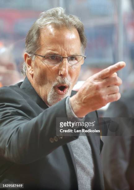 Head Coach of the Philadelphia Flyers John Tortorella reacts to the play on the ice during the first period against the Carolina Hurricanes at the...