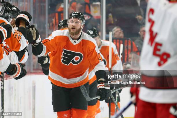 Nicolas Deslauriers of the Philadelphia Flyers celebrates his second period goal against the Carolina Hurricanes with his teammates on the bench at...