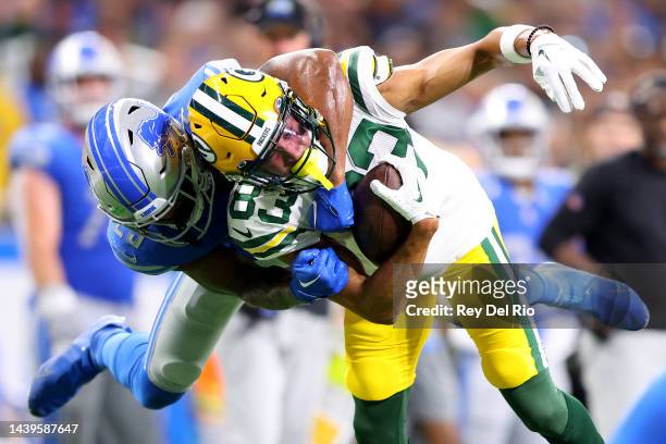 Samori Toure of the Green Bay Packers runs with the ball as a Detroit Lions works to tackle him in the second half at Ford Field on November 06, 2022...