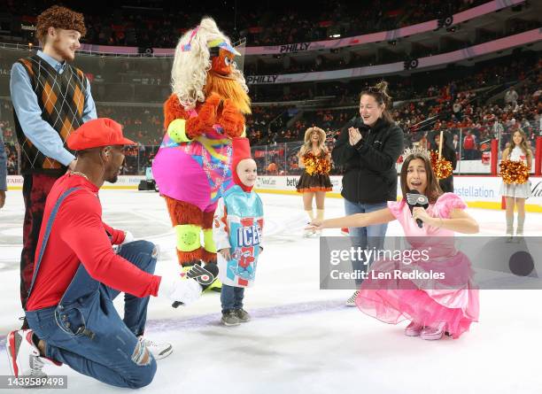 View of a Halloween costume contest during the second period intermission at an NHL game between the Philadelphia Flyers and the Carolina Hurricanes...