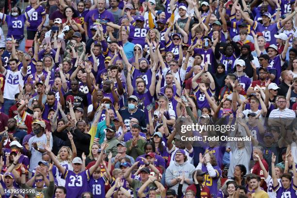 Minnesota Vikings fans celebrate in the fourth quarter of the game against the Washington Commanders at FedExField on November 06, 2022 in Landover,...