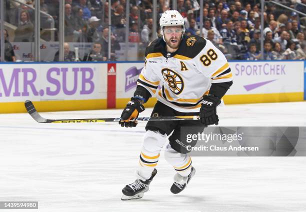 David Pastrnak of the Boston Bruins skates against the Toronto Maple Leafs during an NHL game at Scotiabank Arena on November 5, 2022 in Toronto,...