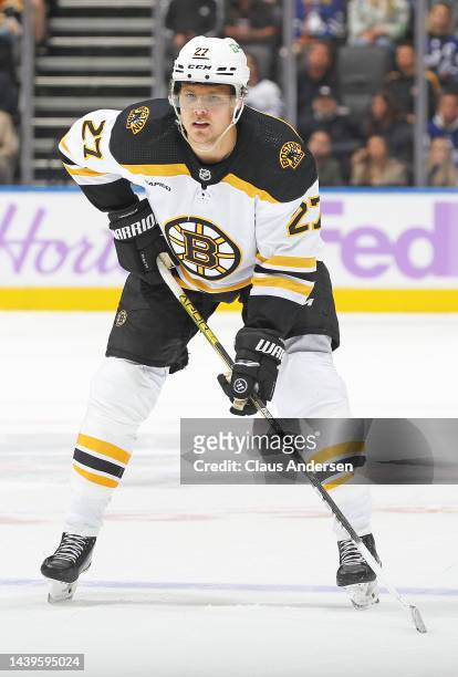 Hampus Lindholm of the Boston Bruins waits for a puck drop against the Toronto Maple Leafs during an NHL game at Scotiabank Arena on November 5, 2022...