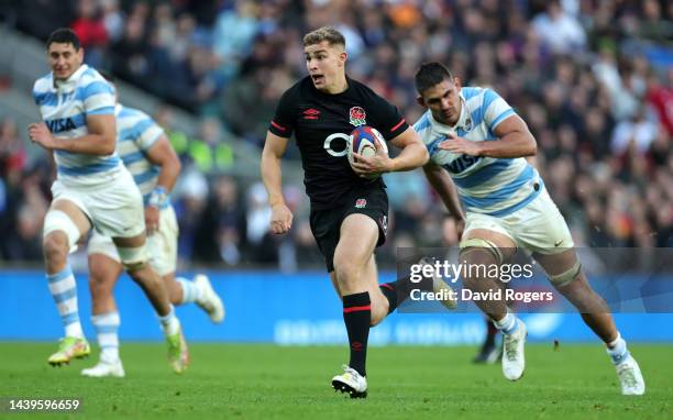 Jack van Poortvliet of England breaks clear to score their second try during the Autumn International match between England and Argentina at...