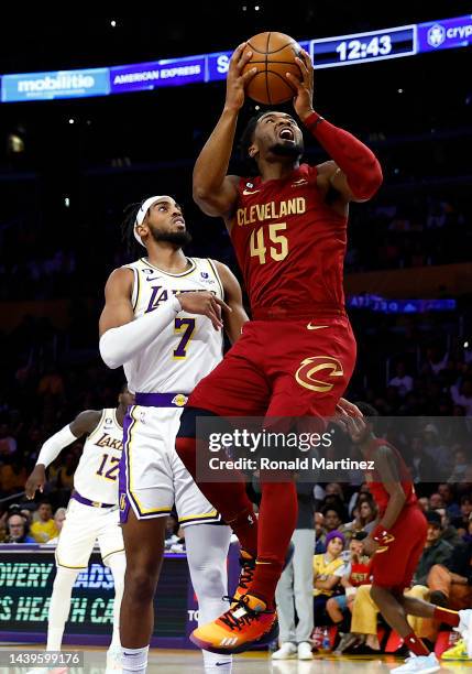 Donovan Mitchell of the Cleveland Cavaliers takes a shot against Troy Brown Jr. #7 of the Los Angeles Lakers in the first quarter at Crypto.com Arena...