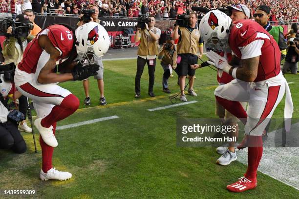 DeAndre Hopkins of the Arizona Cardinals celebrates with James Conner of the Arizona Cardinals after catching a touchdown pass in the first quarter...