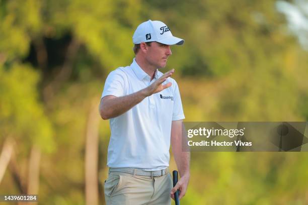 Russell Henley of United States celebrates winning the championship after the final round of the World Wide Technology Championship at Club de Golf...