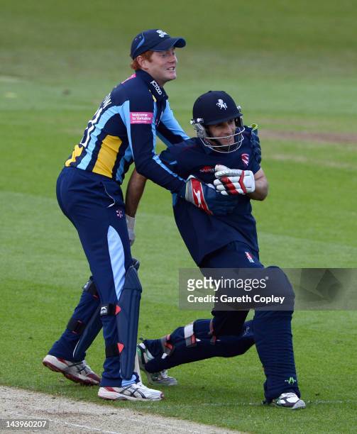 Yorkshire wicketkeeper Jonathan Bairstow holds on to Brendan Nash of Kent during the Clydesdale Bank Pro40 match between Yorkshire and Kent at...