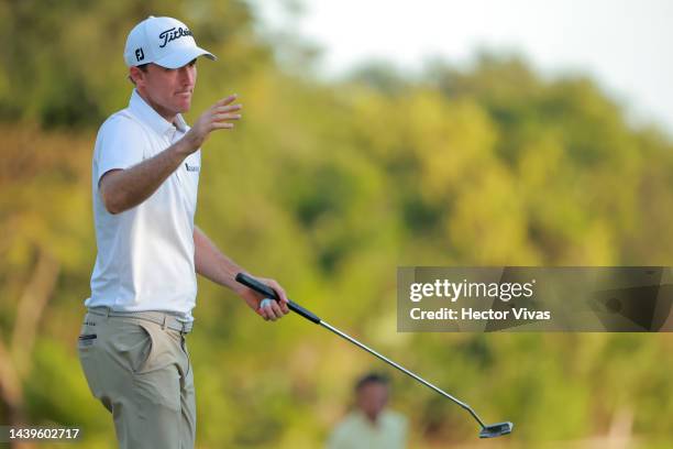 Russell Henley of United States celebrates winning the championship after the final round of the World Wide Technology Championship at Club de Golf...