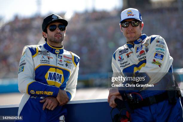 Chase Elliott, driver of the NAPA Auto Parts Chevrolet, and crew chief Alan Gustafson wait on the grid prior to the NASCAR Cup Series Championship at...