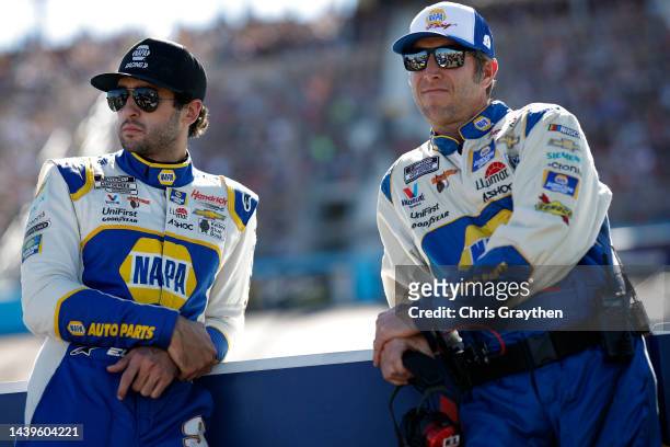 Chase Elliott, driver of the NAPA Auto Parts Chevrolet, and crew chief Alan Gustafson wait on the grid prior to the NASCAR Cup Series Championship at...