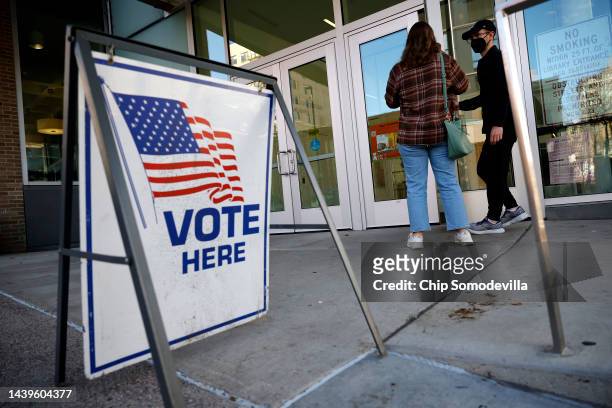 Voters arrive to cast their absentee ballots at the Madison Central Public Library on the last day of early voting on November 06, 2022 in Milwaukee,...