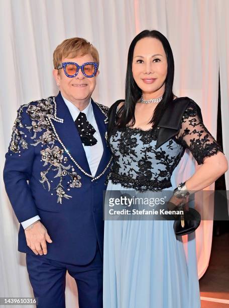 Elton John and LACMA Art + Film Gala Co-Chair Eva Chow, wearing Gucci, attend the 2022 LACMA ART+FILM GALA Presented By Gucci at Los Angeles County...
