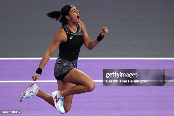 Caroline Garcia of France celebrates after defeating Maria Sakkari of Greece in their Women's Singles Semifinal match during the 2022 WTA Finals,...