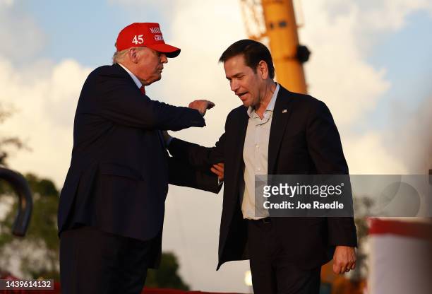 Former U.S. President Donald Trump stands with Sen. Marco Rubio during a rally at the Miami-Dade County Fair and Exposition on November 6, 2022 in...