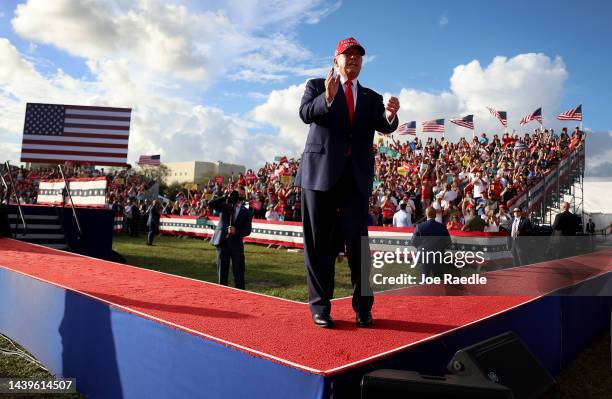 Former U.S. President Donald Trump walks on stage during a rally for Sen. Marco Rubio at the Miami-Dade Country Fair and Exposition on November 6,...