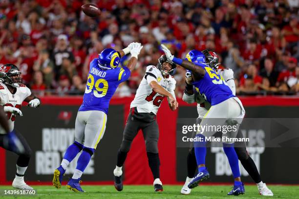 Aaron Donald of the Los Angeles Rams tips a pass from Tom Brady of the Tampa Bay Buccaneers in the fourth quarter at Raymond James Stadium on...