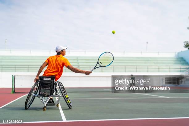 sport, athlete with disabilities, wheelchair, disability, - schlägersport stock-fotos und bilder