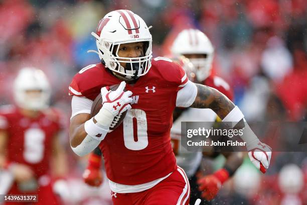 Braelon Allen of the Wisconsin Badgers rushes the ball against the Maryland Terrapins at Camp Randall Stadium on November 05, 2022 in Madison,...