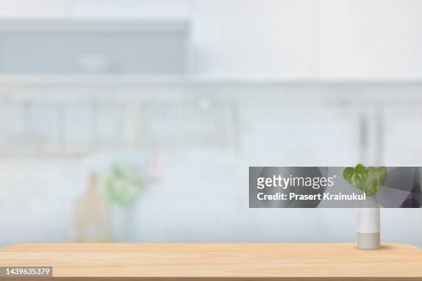 empty tabletop in kitchen - wood table top stock-fotos und bilder