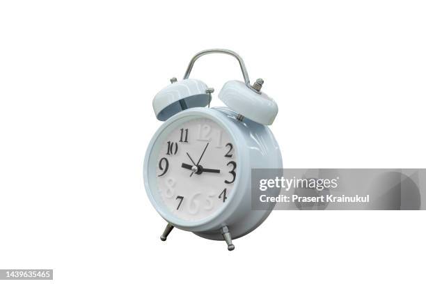 white alarm clock. clipping path - hand bell stock pictures, royalty-free photos & images