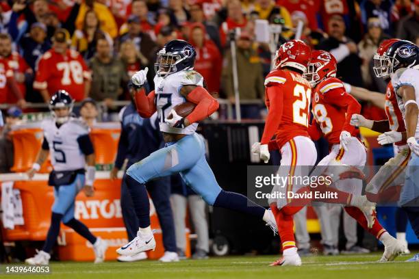 Derrick Henry of the Tennessee Titans runs the ball against the Kansas City Chiefs in the first at Arrowhead Stadium on November 06, 2022 in Kansas...