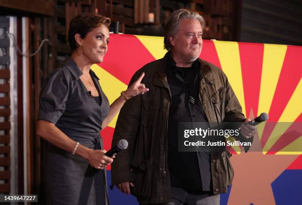 Arizona Republican gubernatorial candidate Kari Lake appears on stage with Steve Bannon during a get out the vote campaign rally on November 05, 2022...