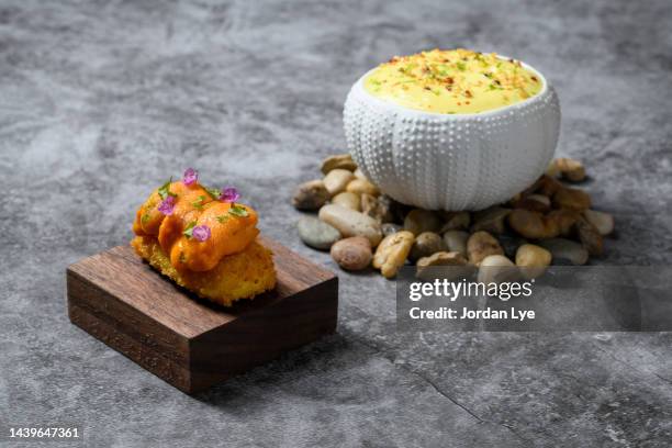 bafun uni with chawanmushi and fennel emulsion - chawanmushi stock pictures, royalty-free photos & images