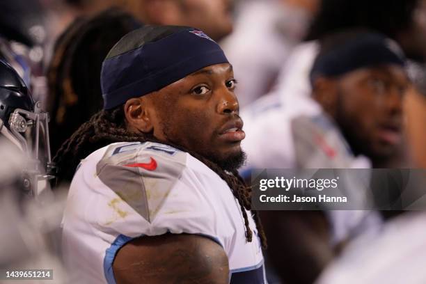 Derrick Henry of the Tennessee Titans sits on the bench during the first half of their game against the Kansas City Chiefs at Arrowhead Stadium on...