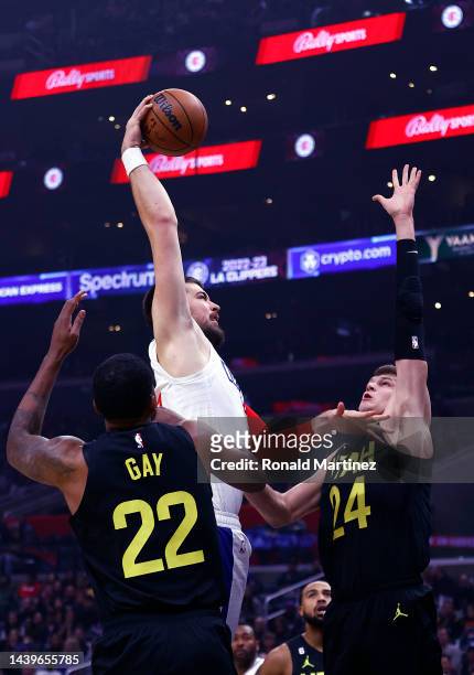 Ivica Zubac of the LA Clippers makes the slam dunk against Walker Kessler of the Utah Jazz in the first half at Crypto.com Arena on November 06, 2022...