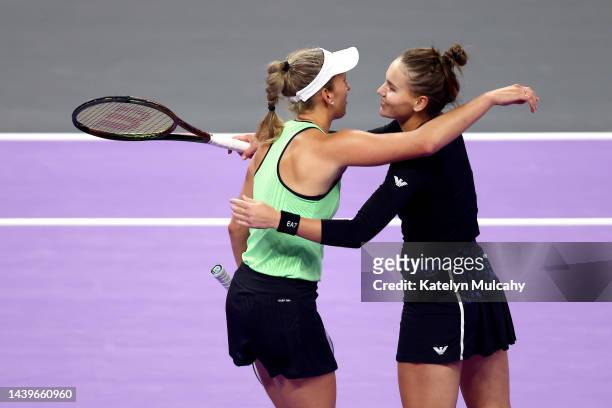Elise Mertens of Belgium and Veronika Kudermetova of Russia celebrate after defeating Desirae Krawczyk of the United States and Demi Schuurs of the...
