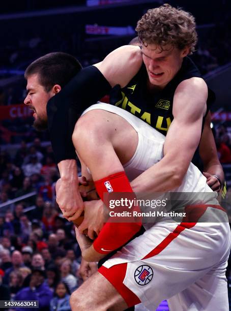 Lauri Markkanen of the Utah Jazz gets a jump ball against Ivica Zubac of the LA Clippers in the second half at Crypto.com Arena on November 06, 2022...