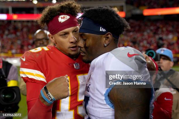 Patrick Mahomes of the Kansas City Chiefs hugs Malik Willis of the Tennessee Titans after the Chiefs veat the Titans in overtime at Arrowhead Stadium...