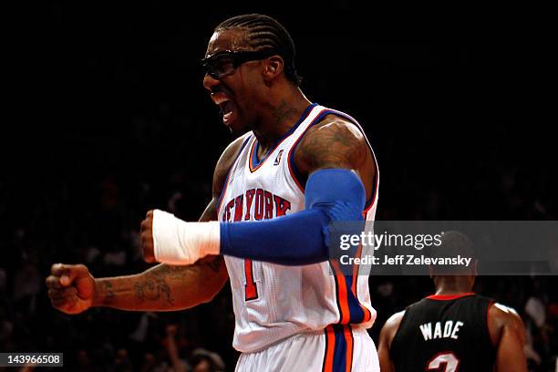 Amare Stoudemire of the New York Knicks reacts after he dunked in the first half against the Miami Heat in Game Four of the Eastern Conference...