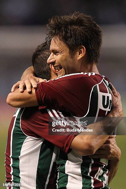 May 06: Rafael Sobis and Thiago Neves of Fluminense celebrate a scored goal during the final first leg match between Botafogo v Fluminense as part of...