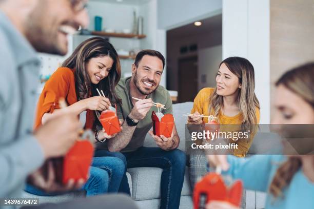 group of people enjoying fast food together - non moving activity stock pictures, royalty-free photos & images