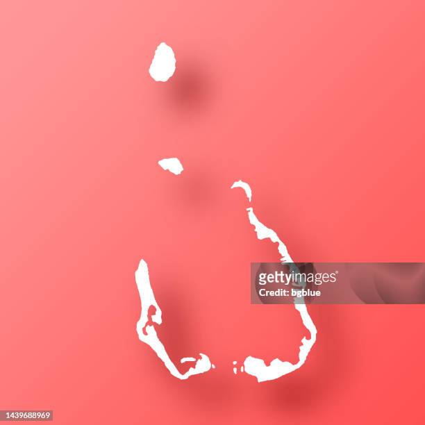 cocos islands map on red background with shadow - cocos island costa rica stock illustrations