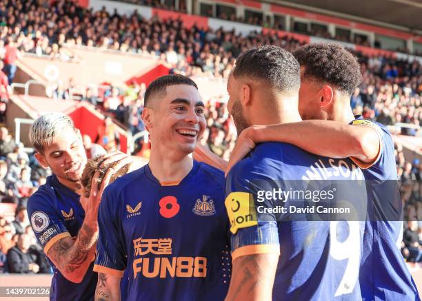 Miguel Almiron of Newcastle United celebrates his goal with fellow Newcastle United players during the Premier League match between Southampton FC...