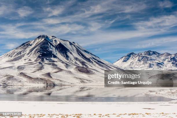 volcanos around laguna miñiques - cordillera-administrative-region stock pictures, royalty-free photos & images