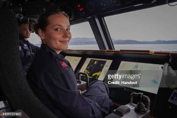 In this handout image provided by the The Royal Court Of Norway, Princess Ingrid Alexandra visits the Norwegian Navy on October 25, 2022 in...