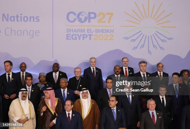 World leaders, including Egyptian President Abdel Fattah El-Sisi , pose for a group photo during the Sharm El-Sheikh Climate Implementation Summit of...