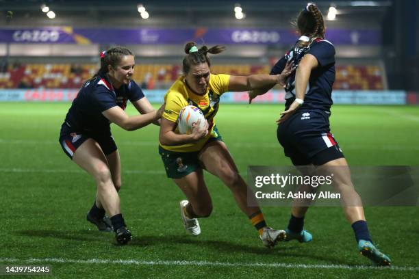 Evania Pelite of Australia runs towards the Try-line during the Women's Rugby League World Cup Group B match between Australia Women and France Women...